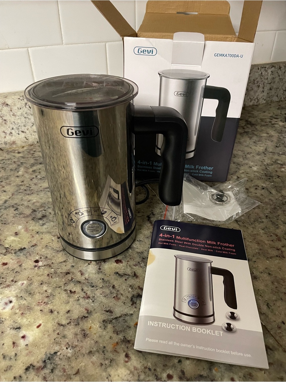 Gevi 4-in-1 automatic milk frother with a stainless steel body chocolate coffee